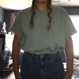 These Three boutiques has string tie T-shirt